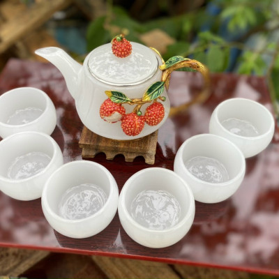 Bộ ấm trà chạm cây vải đá bạch ngọc