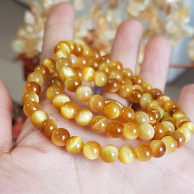 Vòng tay đá Mắt Hổ vàng tươi đồng tâm quấn 3 vòng 6ly