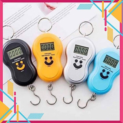 CÂN ĐIỆN TỬ CẦM TAYCÂN MINI ĐIỆN TỬ CẦM TAY HÌNH MẶT CƯỜI SỬ DỤNG CÂN HÀNG HOẶC ĐI CHỢ TIỆN LỢI