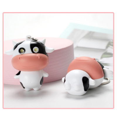 Móc khóa con bò sữa cute mắt có đèn phát sáng, phát ra tiếng kêu ngộ nghĩnh