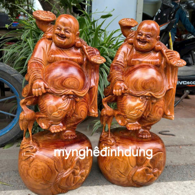 Tượng phật di lặc đắt cò bằng gỗ hương đá cao 50cm