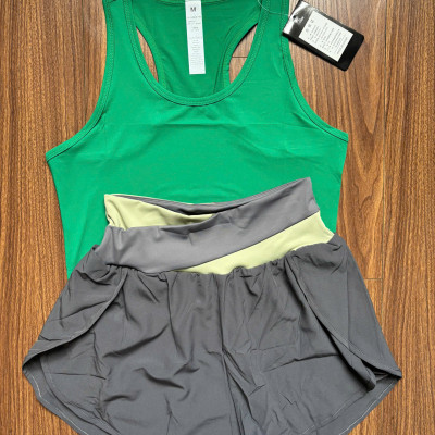 Bộ đồ thể thao nữ gồm áo ba lỗ khoét lưng và quần đùi 2 lớp hàng Quảng Châu cao cấp