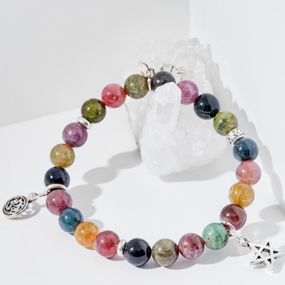 Vòng tay tourmaline đa sắc charm cỏ 4 lá Ngọc Quý Gemstones