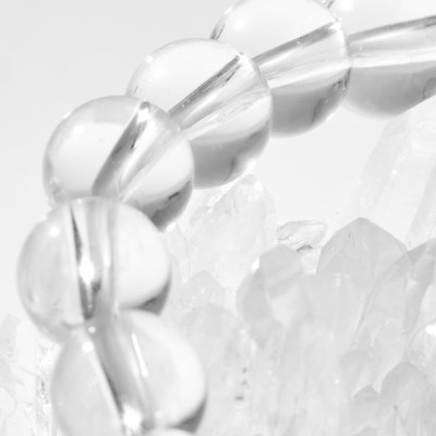 Vòng tay thạch anh trắng charm lục tự bạc Ngọc Quý Gemstones