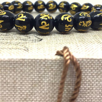 Vòng Mã Não Đen Khắc Nổi Thần Chú 8MM  